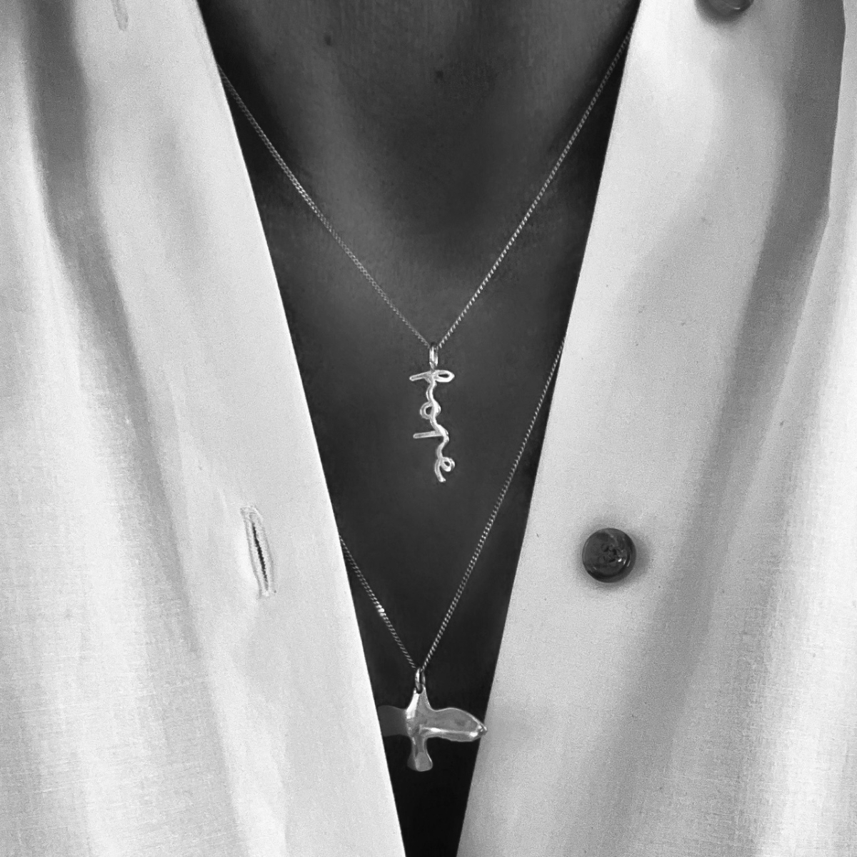 a piece of jewelry that says hope in sterling silver